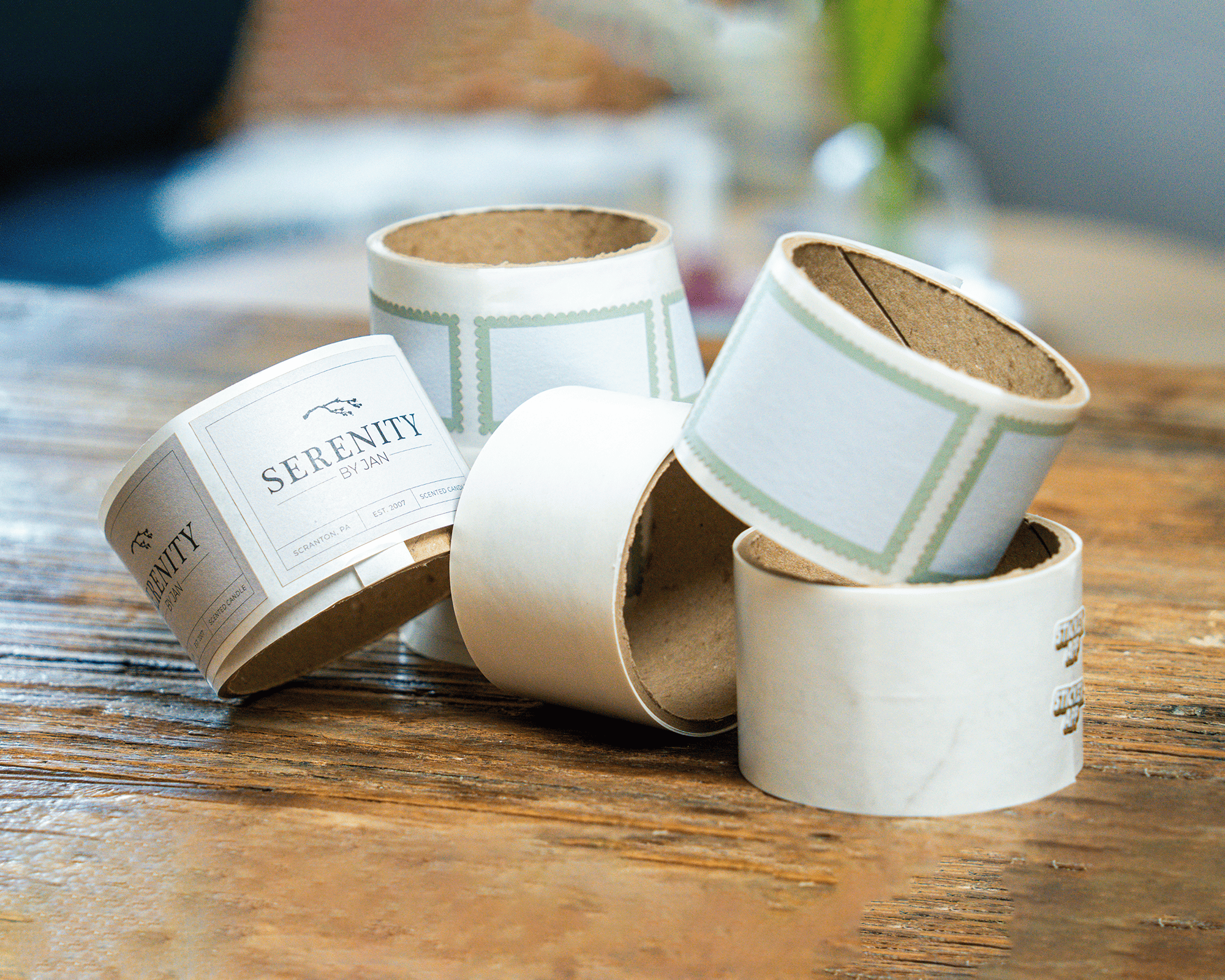 Five labels on roll an a table