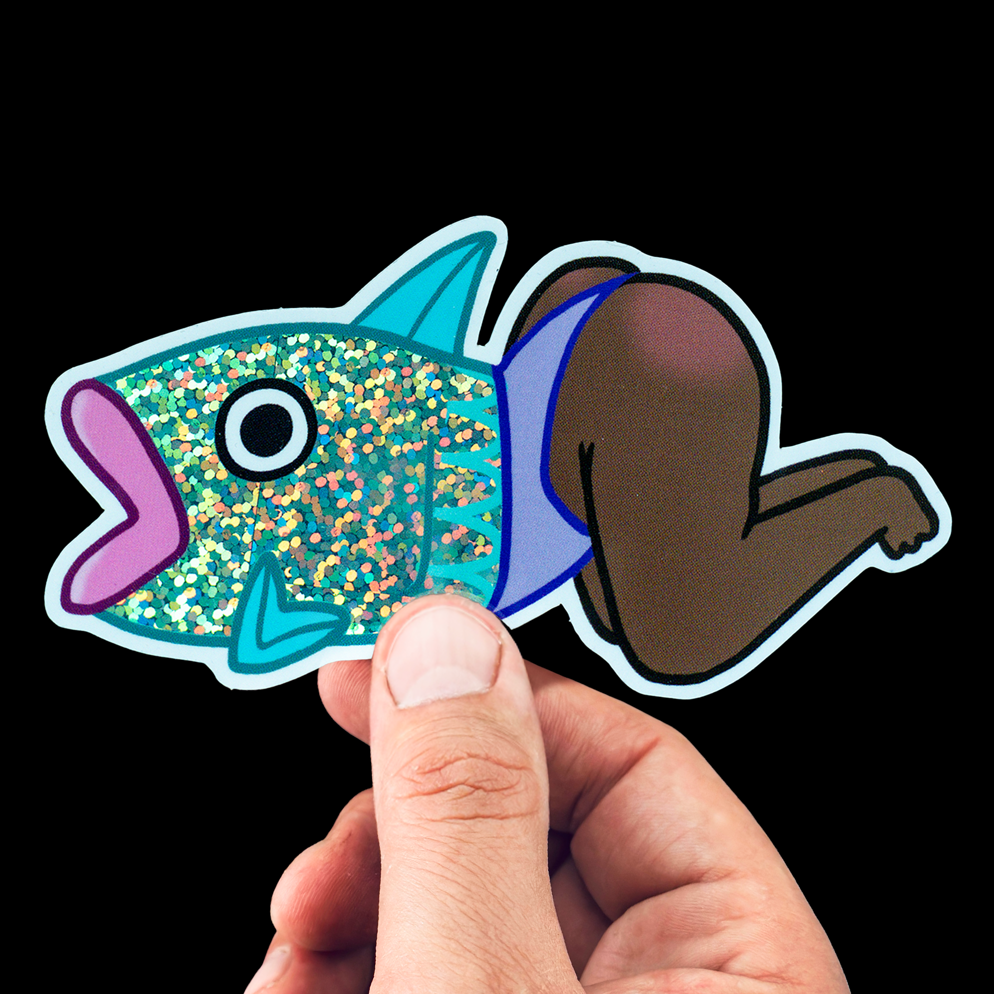 Glitter Sticker of a fish with a human-like lower body in a swimsuit, held by a hand against a black background.